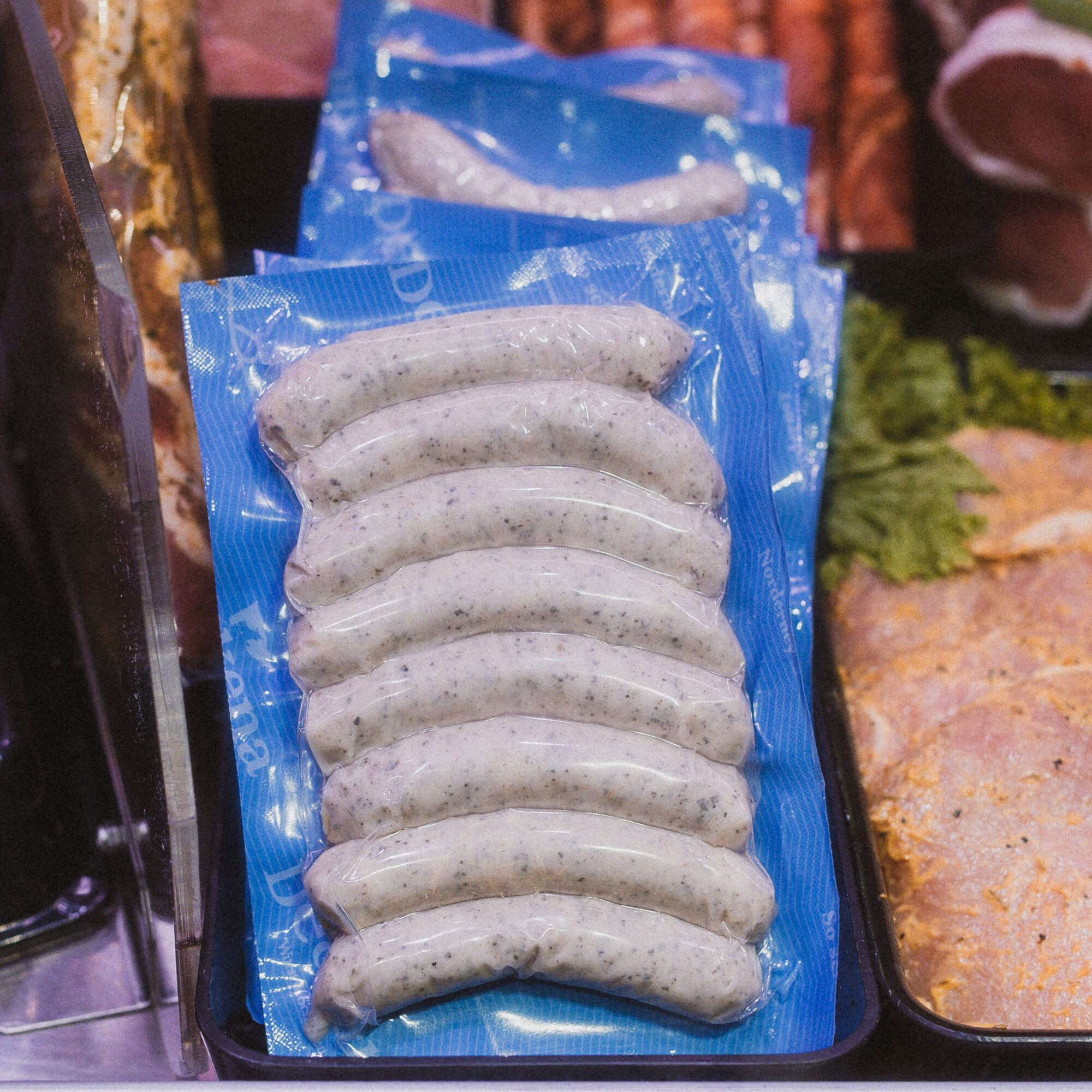 Wurst in individuelle Siegelfolie